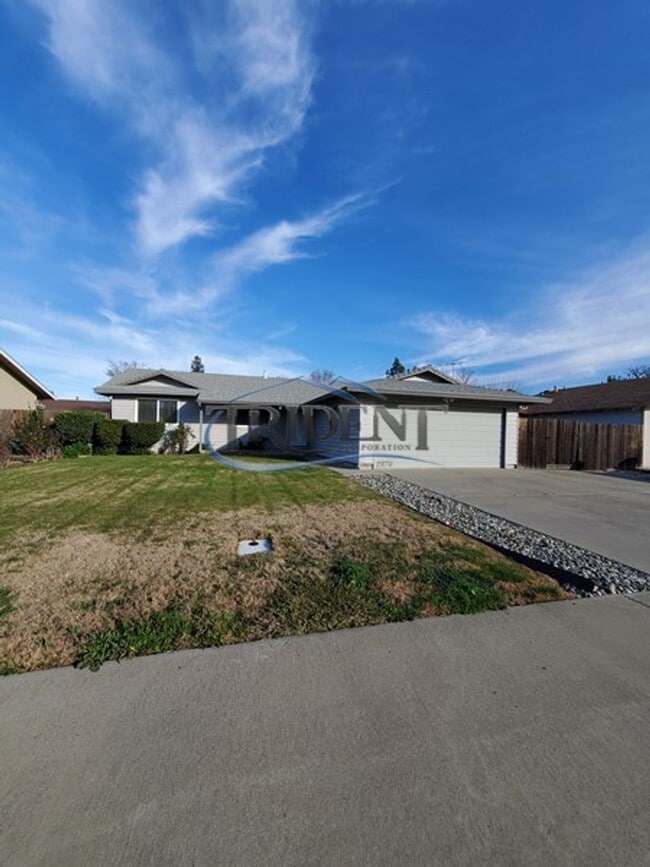 Photo - This is a cute 4 bedroom, 2 bath house in an established Woodland community