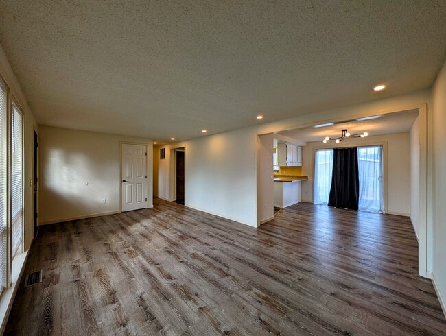 Photo - 3-Bedroom Home w/ 2-Car Garage & Fenced-In Backyard