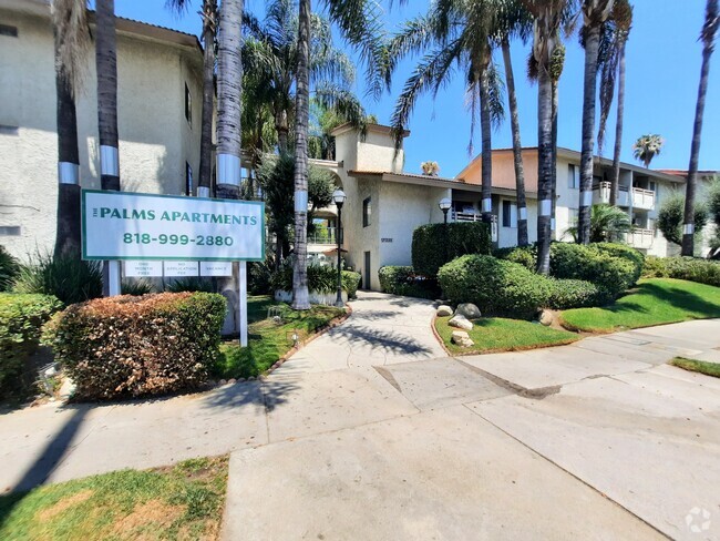 FRONT ENTRANCE - The Palms Apartments