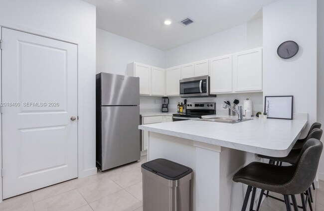 Photo - 844 NW 3rd Way Unidad 844