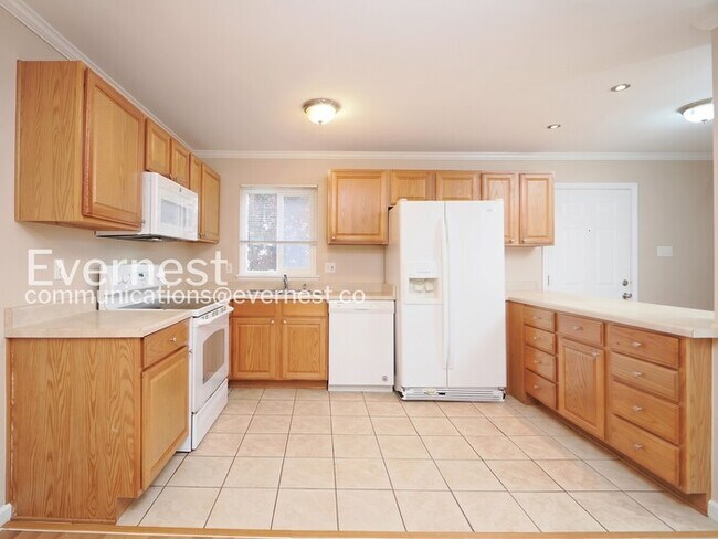 Photo - 2 Bed, 1.5 Bath Condo with Off-Street Parking / Available Now! Unit Apartment E206