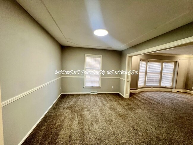 Photo - Spacious 4-Bedroom, 3-Bathroom Home with Fenced Yard and Bonus Spaces!