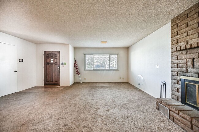 3 bedroom, 2 bath with large living room and brick fireplace.  Good size kitchen with tons of cab...