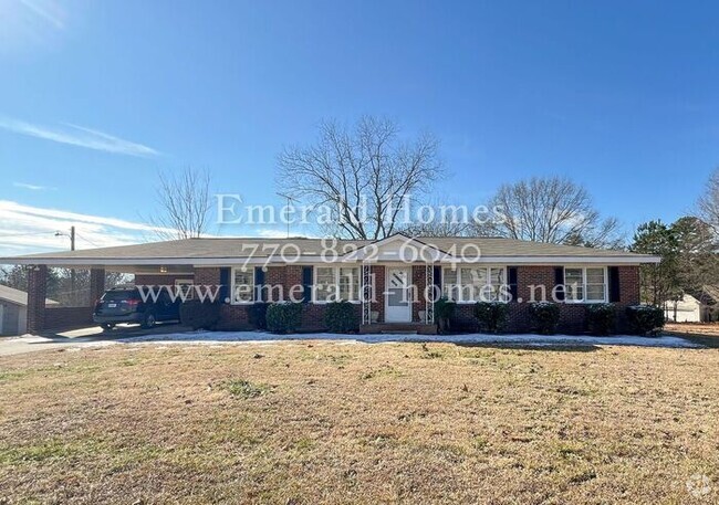 Building Photo - Beautiful cozy 4-side brick ranch home wit...