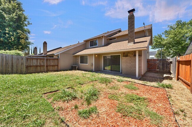 Photo - 3 Bedroom Home with Fireplace and LVP Flooring & 2-Car Garage!