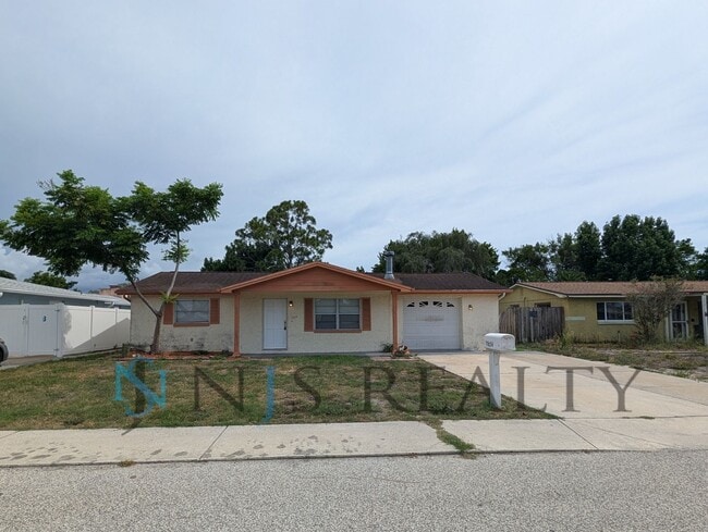 Photo - 3 bed,2 bath ~ With garage, workshop & shed!! NEW floors, NEW paint! Updated bathroom & kitchen w...