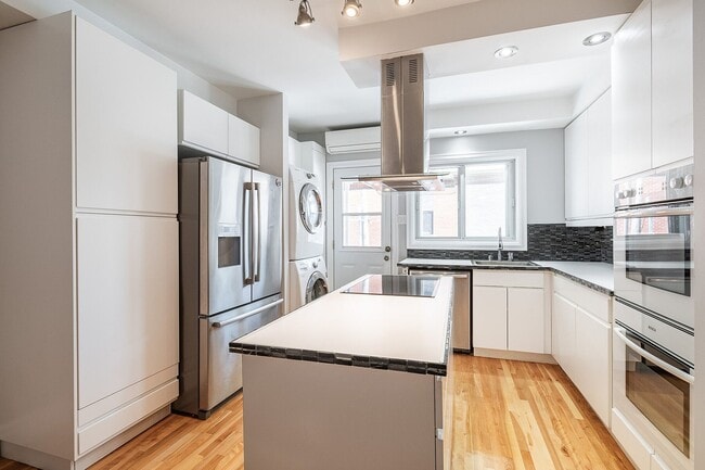 Building Photo - 6001-623e 23e Avenue Unit 3