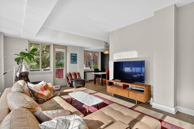 Living Room - 4000 Tunlaw Rd NW Unit 116