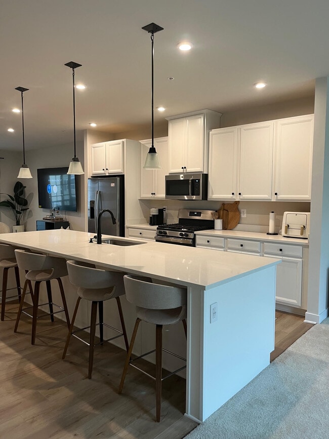 Kitchen with large island. - 10810 Presidential Pky Unit Condominium