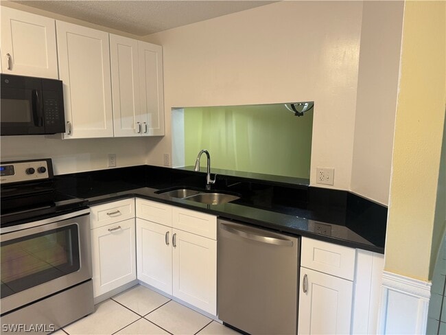 Building Photo - 7779 Jewel Ln Unit 102