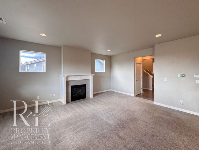 Photo - Vaulted Ceilings, Tree-Lined Views & a Spacious Primary Suite Retreat