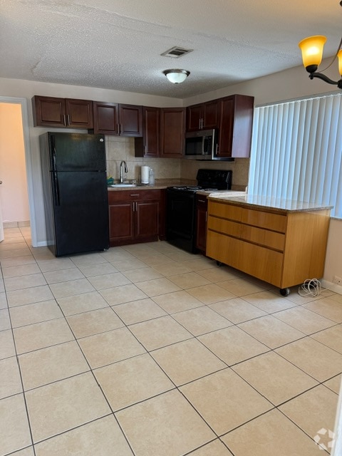 Building Photo - 5972 NW 19th St Unit 3 Rental