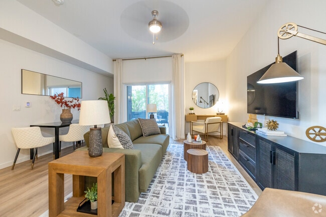 1BR, 1.5BA - 1,080SF - Living Room & Dining Room