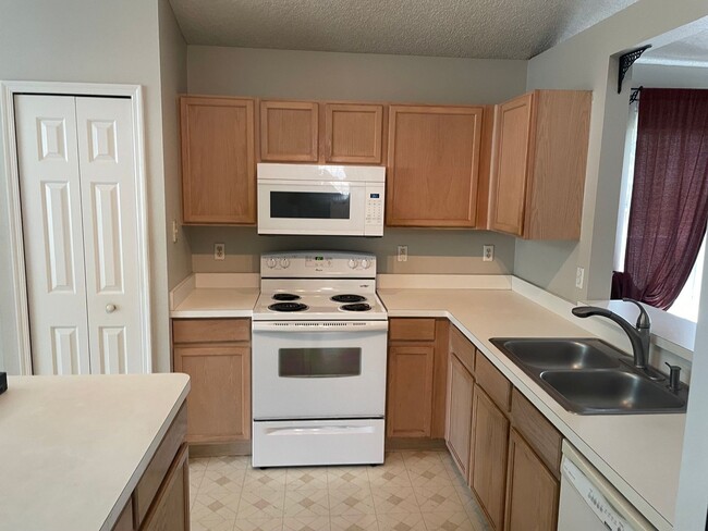 Photo - 3-bedroom, 2-bath home features a 2-car garage