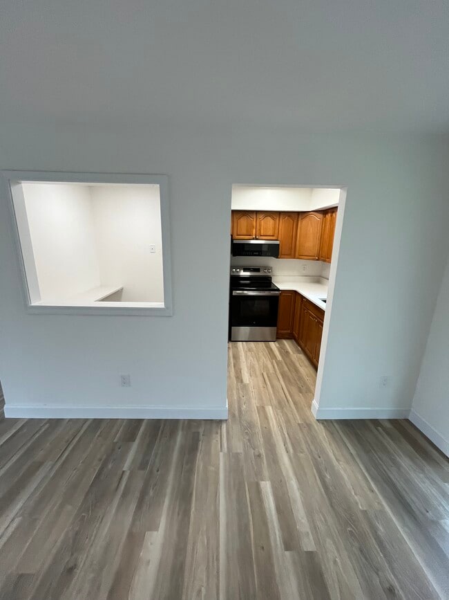 View from dinning room into kitchen - 29 Cedar St Unit 1st Floor A