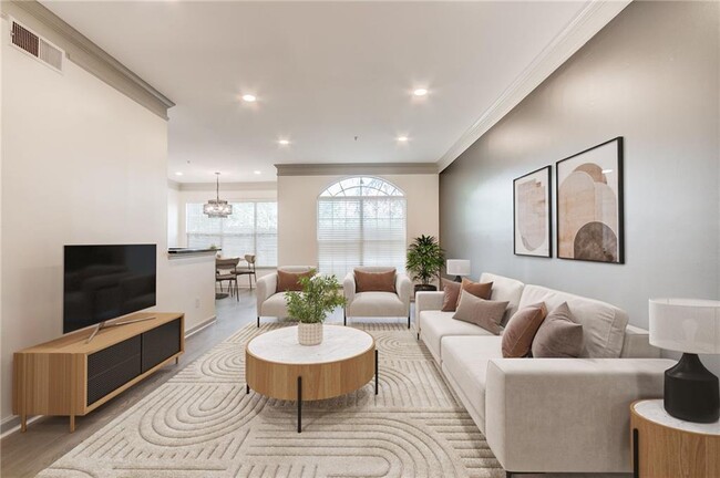 Building Photo - 200 Renaissance Pkwy NE Unit 312