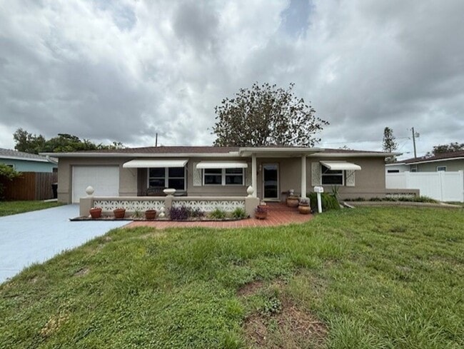 Building Photo - Well maintained 2/2 with a large yard in a... Rental
