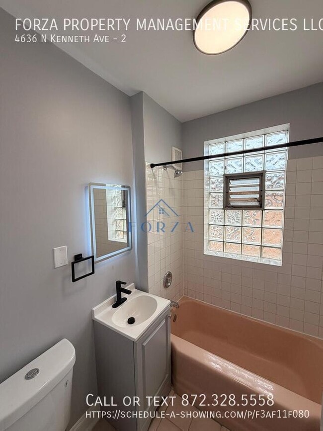 Building Photo - 4636 N Kenneth Ave Unit 2