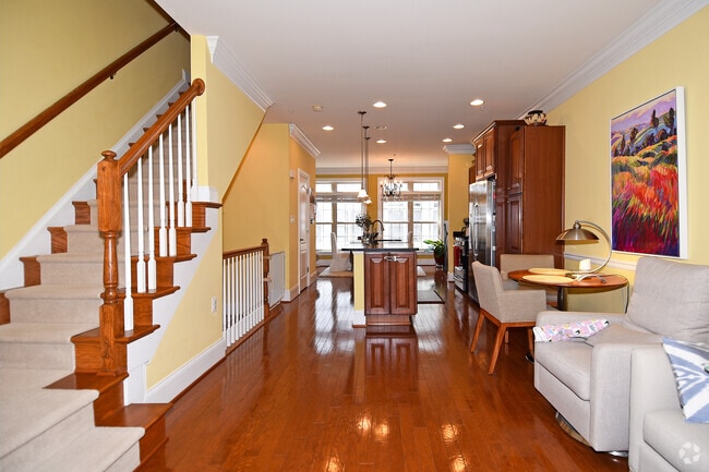 Open kitchen and living room (paint has been updated) - 451 N George Mason Dr Rental