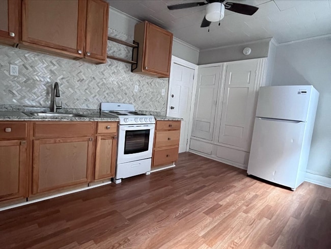 Building Photo - 5235 Woodland Ave