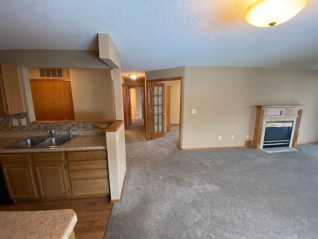 Photo - Top Floor Condo Available March 1, Open Floor Plan, Balcony, Fireplace, Walk-in Closet, 2 Baths, ... Unit 217