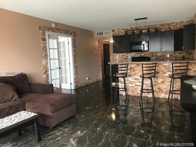 Photo - 600 Three Islands Boulevard Unidad 1018