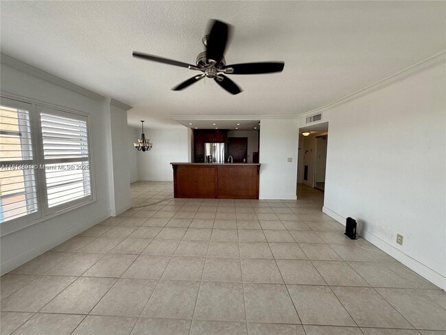 Building Photo - 10777 W Sample Rd Unit 1006 Rental