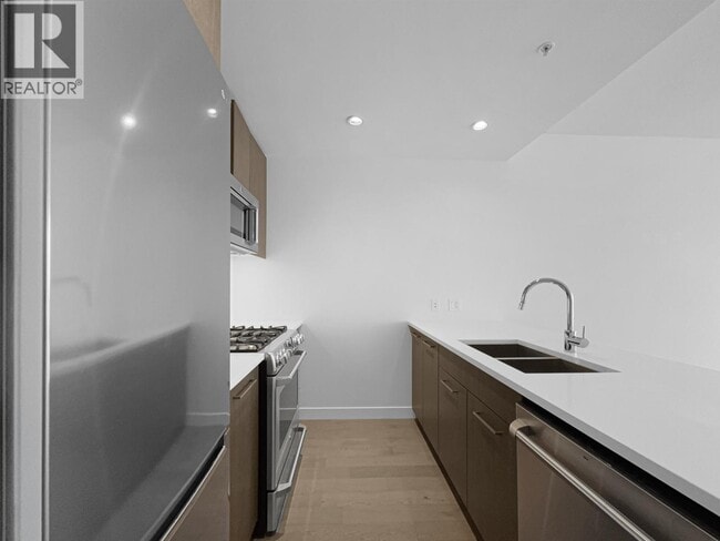 Photo - 9060 University Crescent Unit 9xx