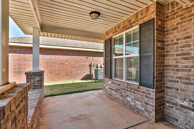 Photo - Relax on this front porch!
