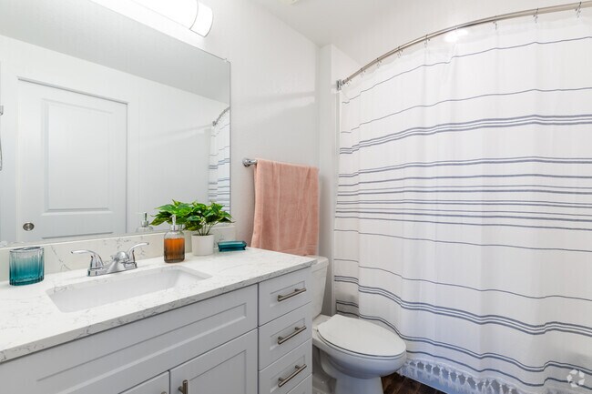 3BR, 2BA - 1048SF Bathroom 1