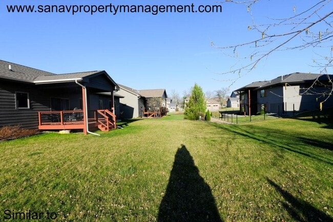 Photo - "Luxury Ranch Living: Your Dream Home with Furnished Basement in Urbandale"