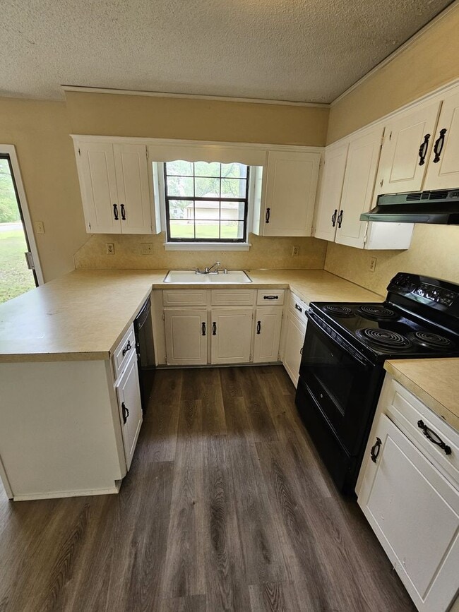 Photo - BELOW MARKET RENT!