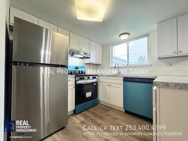 Building Photo - 4016 S Puget Sound Ave Unit 1