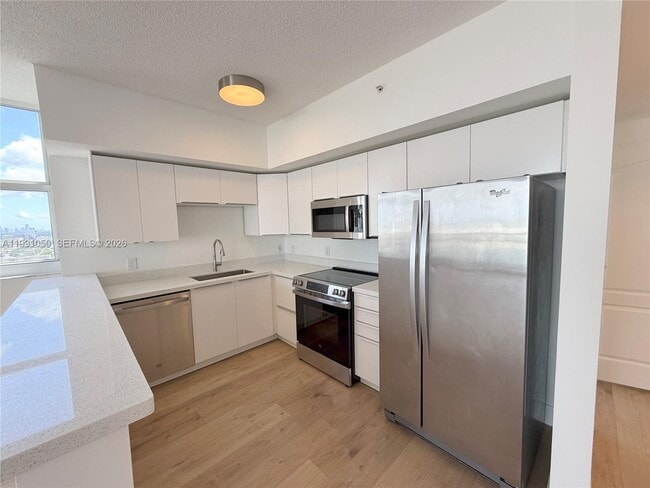 Photo - 5077 NW 7th St Unidad PH1