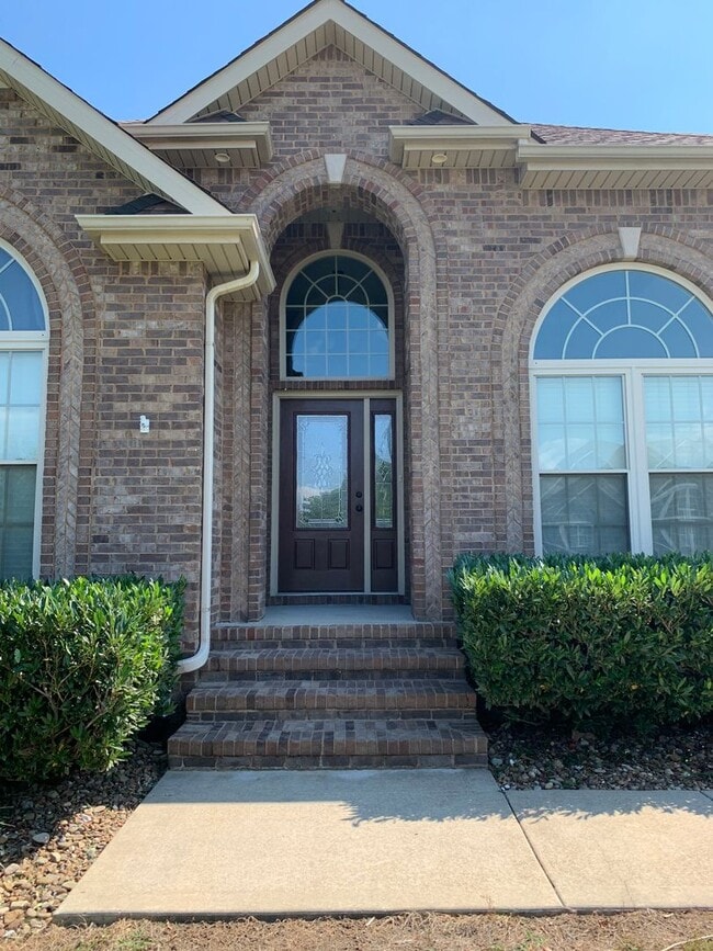 Photo - Luxury Living! Beautiful Brick Home in Sango with 3 car garage.