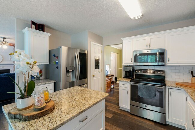 Photo - Corner lot 3 bed 2.5 bath with large fenced yard in Grove Park!