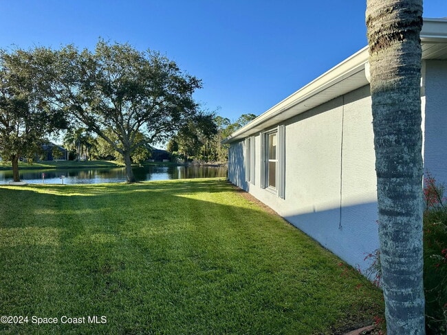 Photo - Charming Four Bedroom Home with a Beautiful Pond in the Back