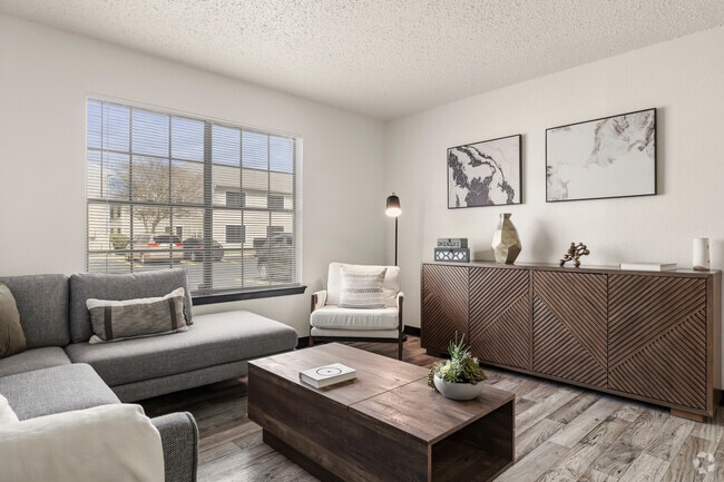 Model 1BR, 1BA - 670SF - Living Room - Ranch at 1856