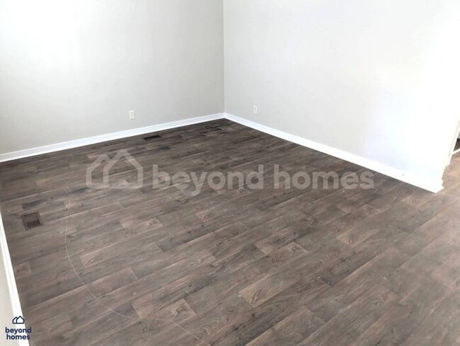 Photo - Updated Bungalow with Massive Deck and Fully Fenced Yard!