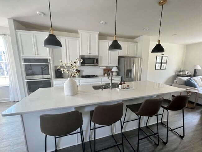 Photo - FULLY FURNISHED high-end beautiful 3 bedroom 3 1/2 bath home in Creekside Commons.