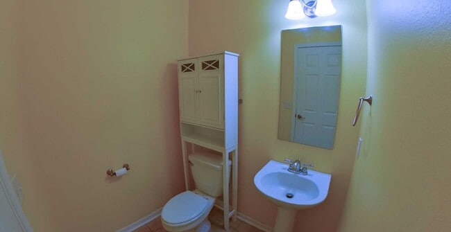 Photo - West Side + Fenced-in Yard + Attached 2-Car Garage + Washer & Dryer! Available June 19th!