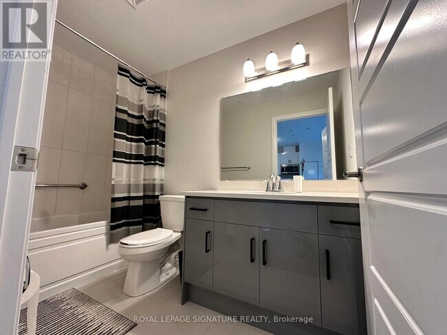 Photo - 3265 Carding Mill Trail Unité 206