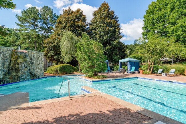 Refreshing Swimming Pool Area with Water Features