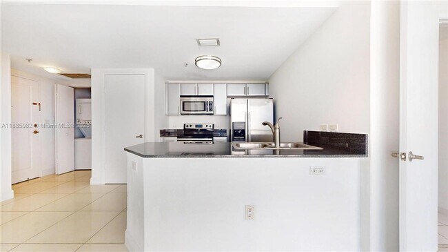Photo - 1871 NW S River Dr Unidad 1205