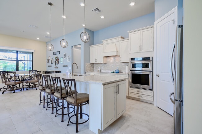“Modern kitchen with ample counter space—perfect for everyday living and entertaining” - 14032 Hawks Eye Ct