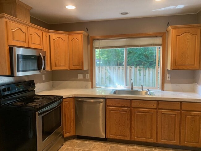 Photo - 3 Bedrooms, 2.5 Baths Two-Story Home With Private Yard