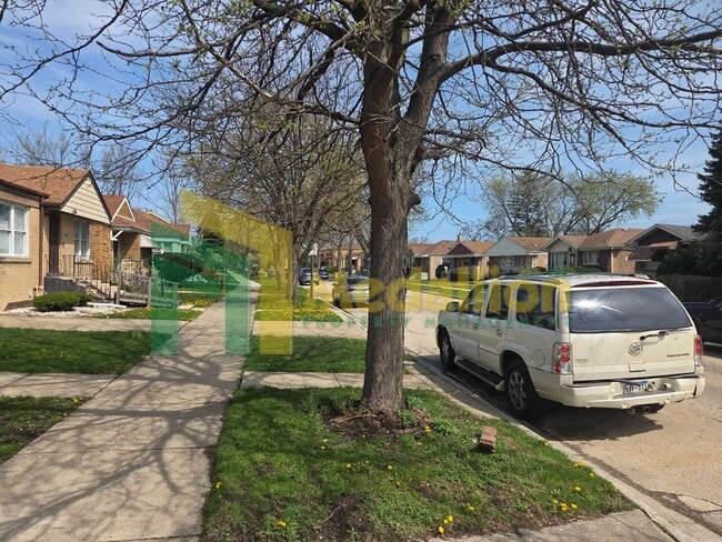 Photo - Spacious 4-Bedroom Home with Finished Basement and Yard Space