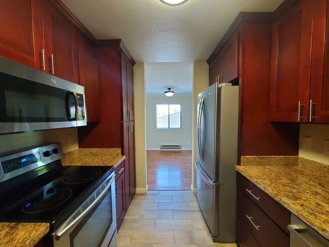 Photo - Spacious 2 bedroom 2 bath condo with perfect floor plan Unit #102