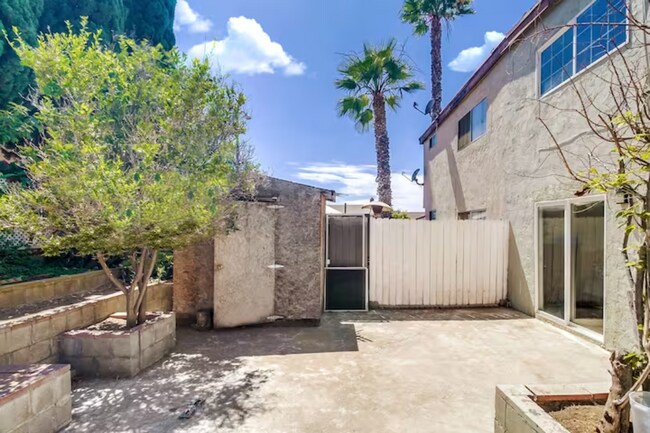 Let your furry friends get some outdoor fun in this gated backyard