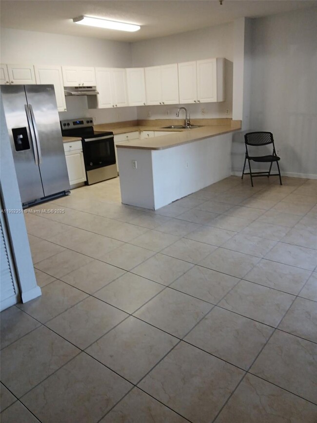 Building Photo - 17350 NW 67th Ave Unit 111